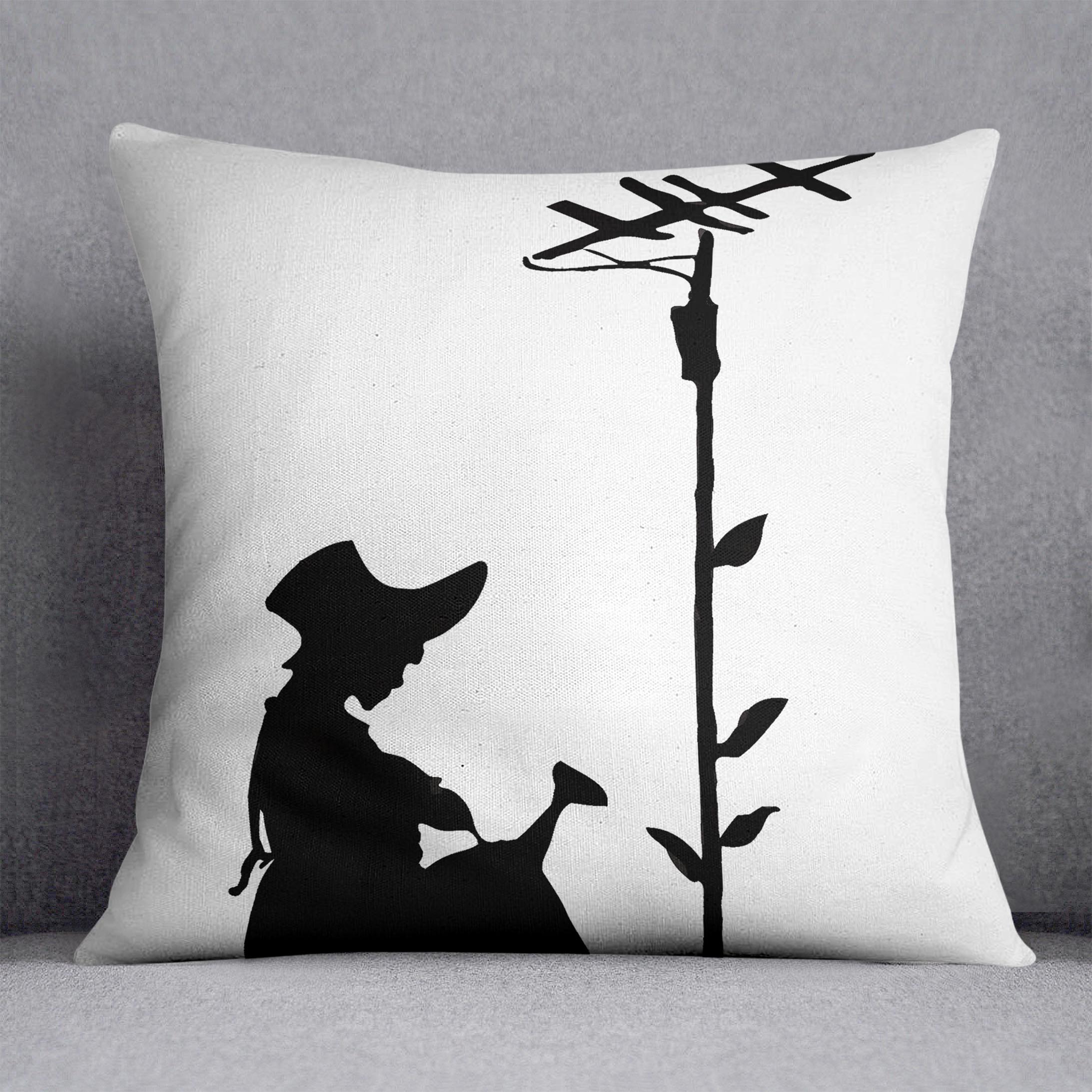 Banksy Flower Aerial Girl Cushion featuring vibrant colors and abstract design on luxurious vegan faux suede.