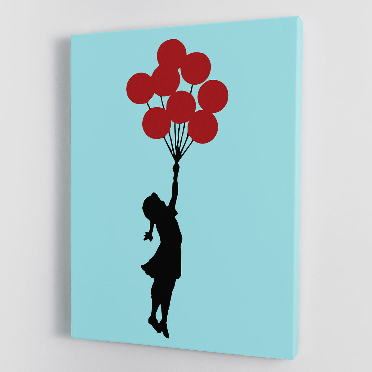 Banksy Flying Balloon Girl Light Blue Canvas Print featuring a girl reaching for a red balloon against a light blue background.