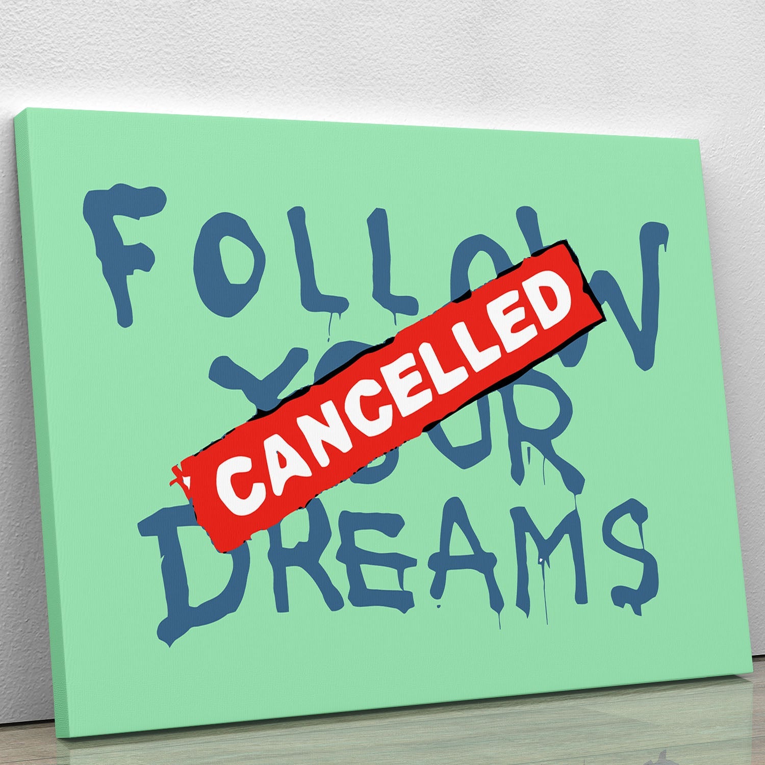 Banksy Follow Your Dreams green canvas print featuring inspirational text and vibrant colors, perfect for home or office decor.