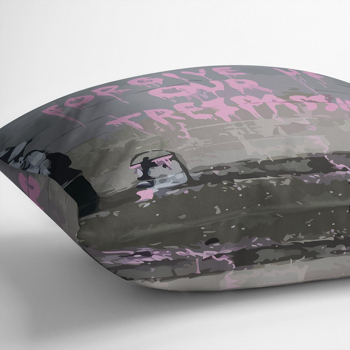 Banksy Forgive Us Cushion featuring vibrant abstract design on luxurious vegan faux suede, perfect for home decor.