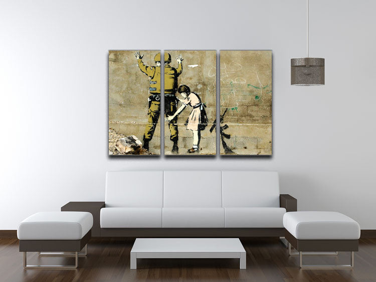 Banksy Girl and Soldier 3 Split Canvas Print featuring three panels with striking artwork.