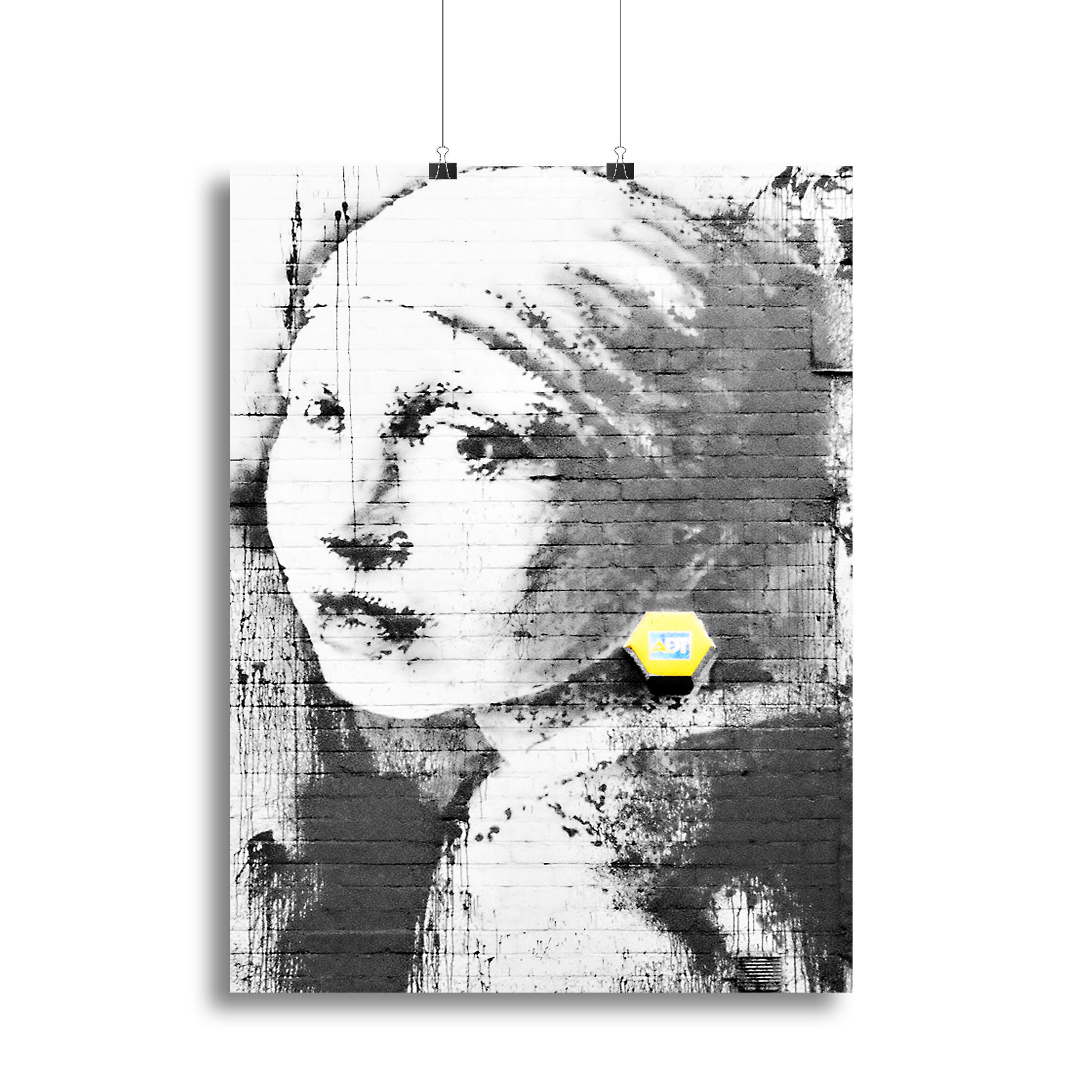 Banksy Girl With a Pierced Eardrum canvas print showcasing a girl with a piercing resembling a smoke alarm, vibrant colors and modern art style.