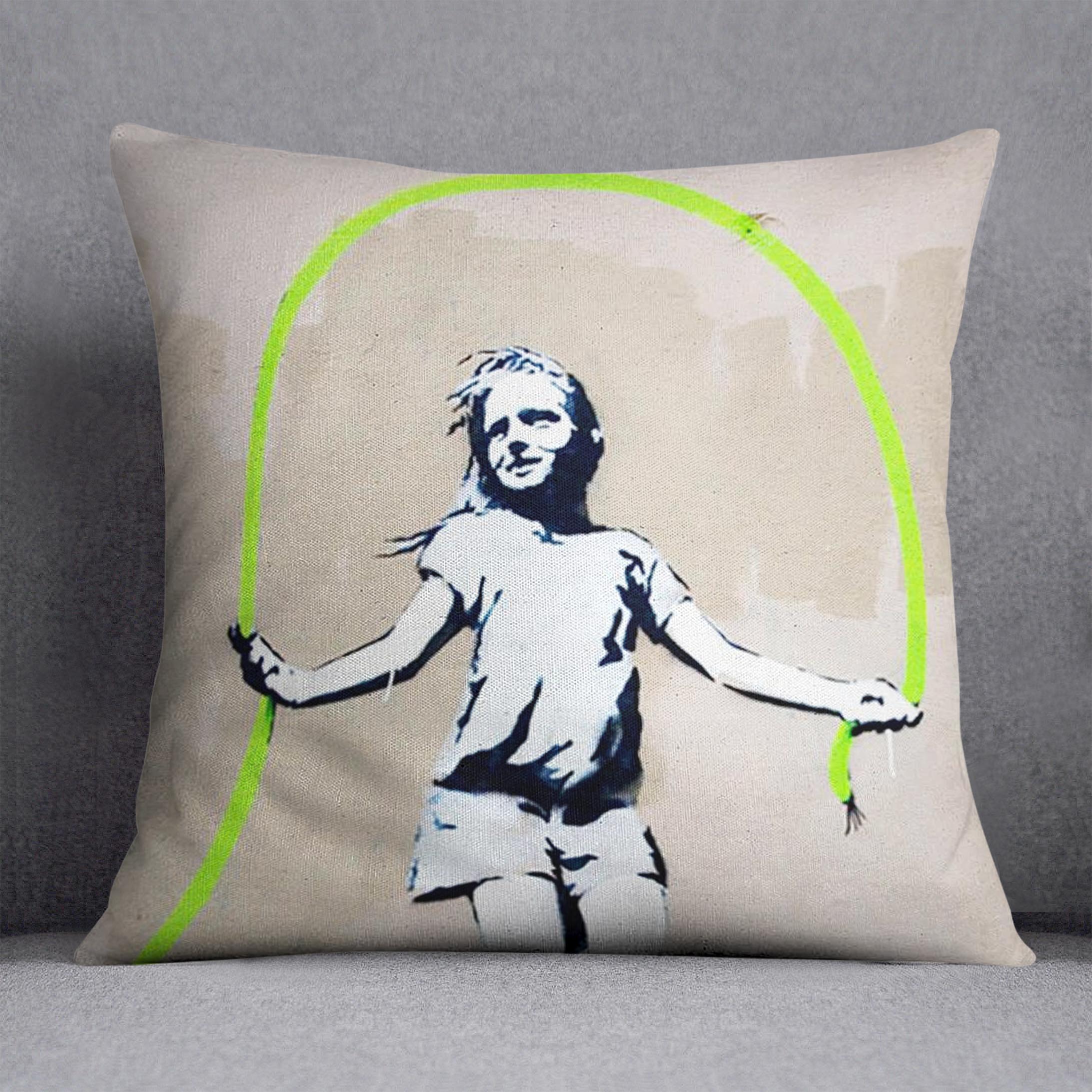 Banksy Girl With Skipping Rope Cushion featuring vibrant colors and luxurious vegan faux suede fabric, perfect for home decor.