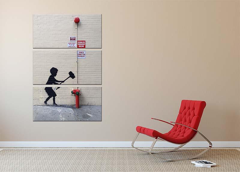 Banksy Hammer Boy 3 Split Panel Canvas Print showcasing a modern art design with vibrant colors and striking imagery.