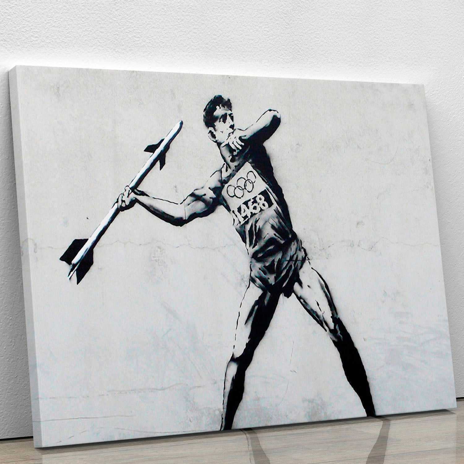 Banksy Javelin Thrower canvas print showcasing a dynamic figure in action, perfect for modern decor.
