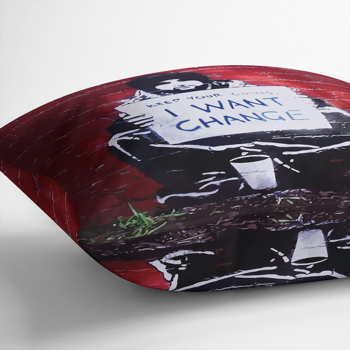 Banksy Keep Your Coins Cushion featuring vibrant abstract design on luxurious vegan faux suede, perfect for home decor.