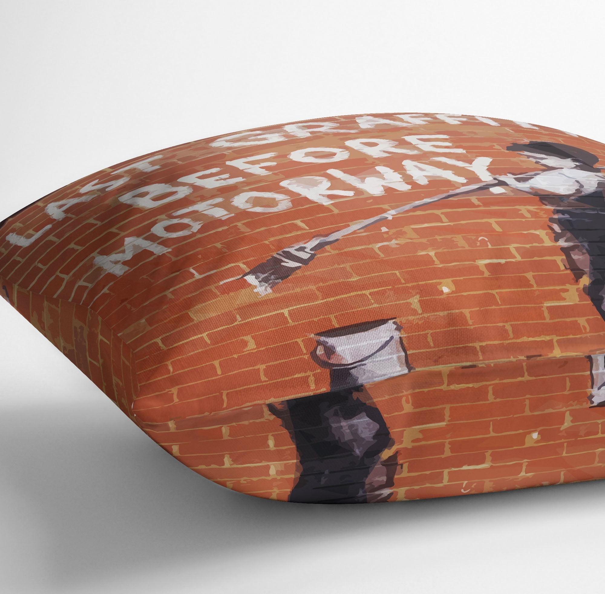 Banksy Last Graffiti Before Motorway Cushion featuring vibrant abstract design on luxurious vegan faux suede.