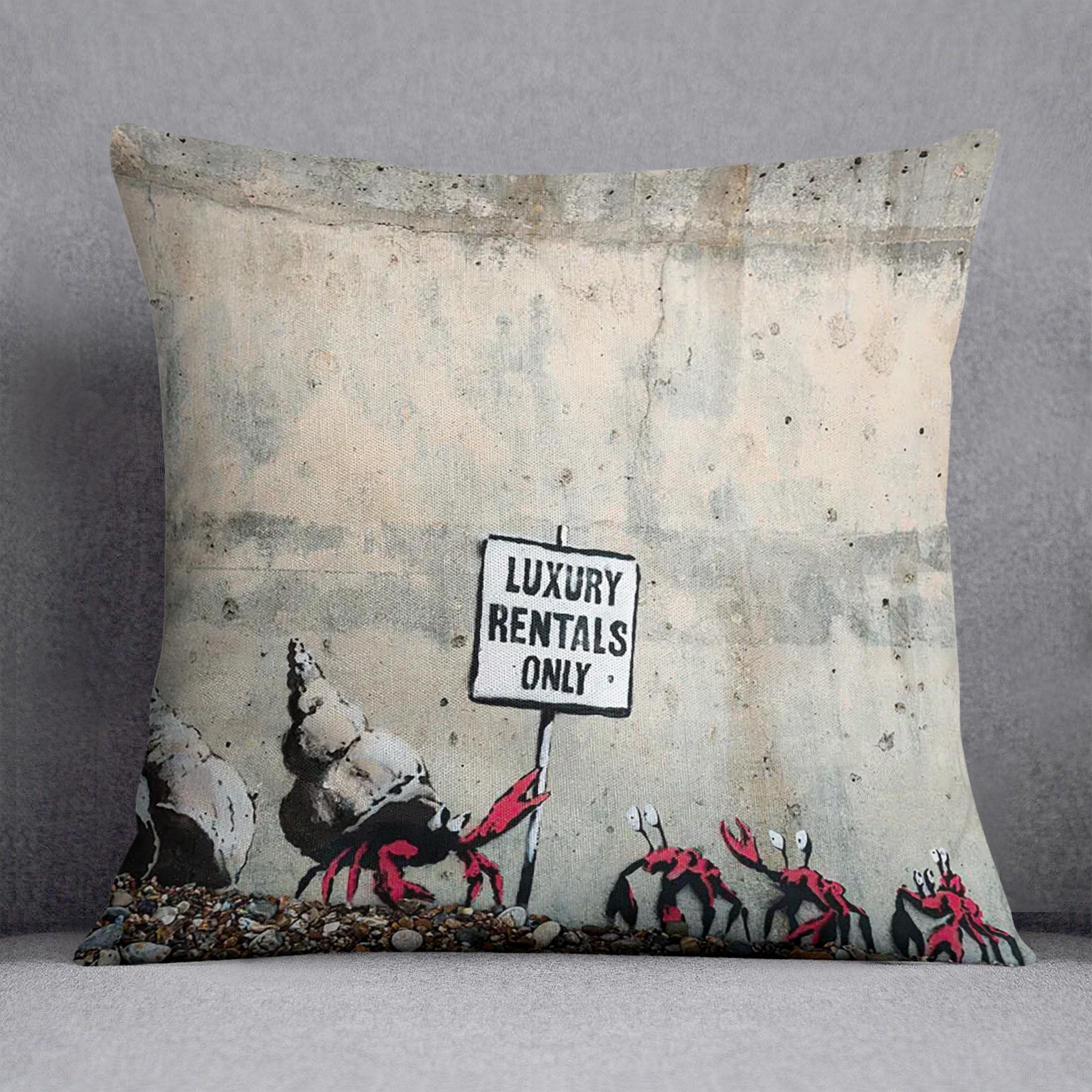 Banksy Luxury Rentals Only Cushion featuring vibrant abstract designs on luxurious vegan faux suede, showcasing its plush filling and handmade quality.