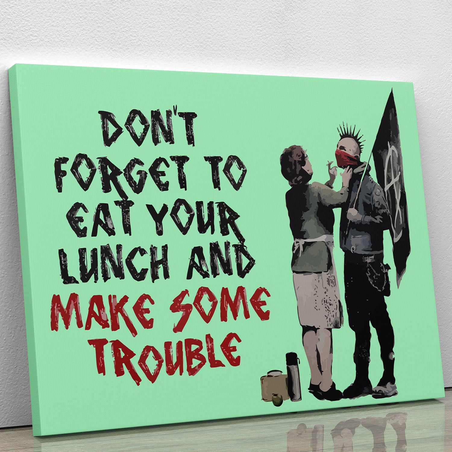 Banksy Make Some Trouble Green Canvas Print featuring vibrant green tones and iconic street art style.
