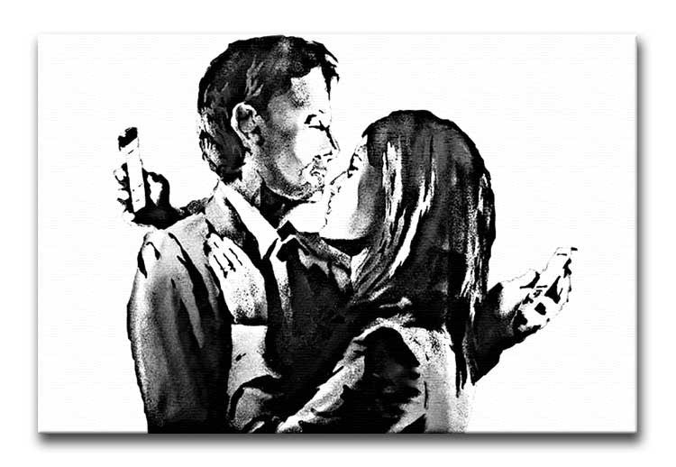 Banksy Mobile Lovers canvas print featuring a couple embracing while using mobile devices, showcasing modern love and technology.