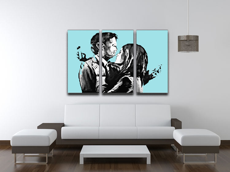 Banksy Mobile Lovers Light Blue 3 Split Panel Canvas Print showcasing three panels of modern art depicting a couple in a loving embrace.
