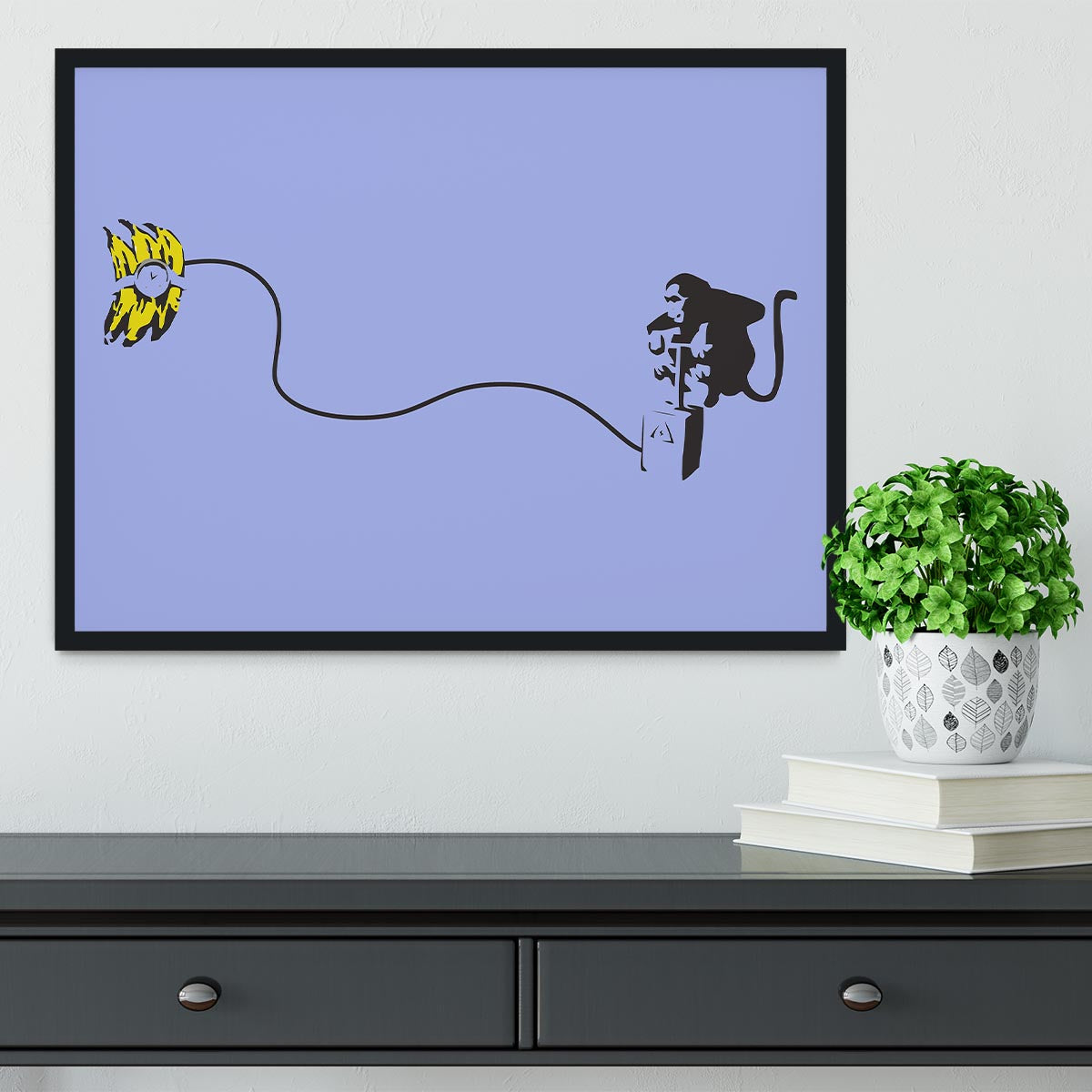 Banksy Monkey Banana Bomb Blue Framed Print showcasing vibrant colors and intricate details in a stylish frame.