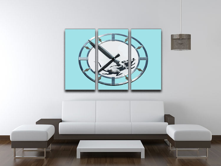 Banksy New York Clock Rat Light Blue 3 Split Panel Canvas Print featuring a rat and clock design in light blue tones, perfect for modern decor.