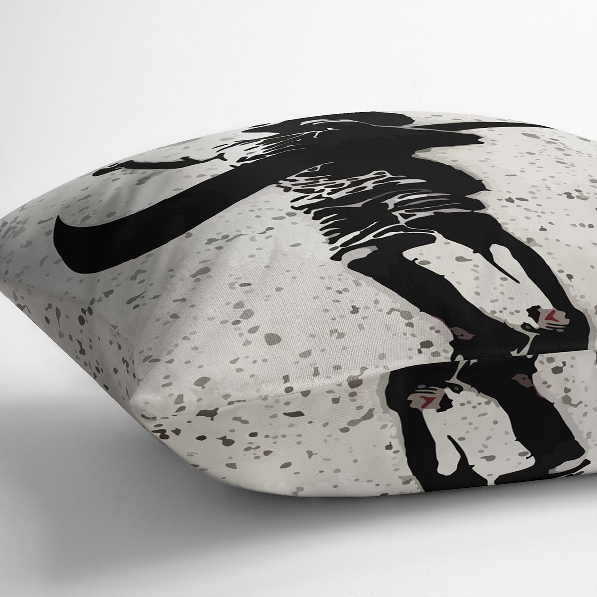 A vibrant Banksy Nike Cushion featuring colorful abstract designs on luxurious vegan faux suede, perfect for home decor.