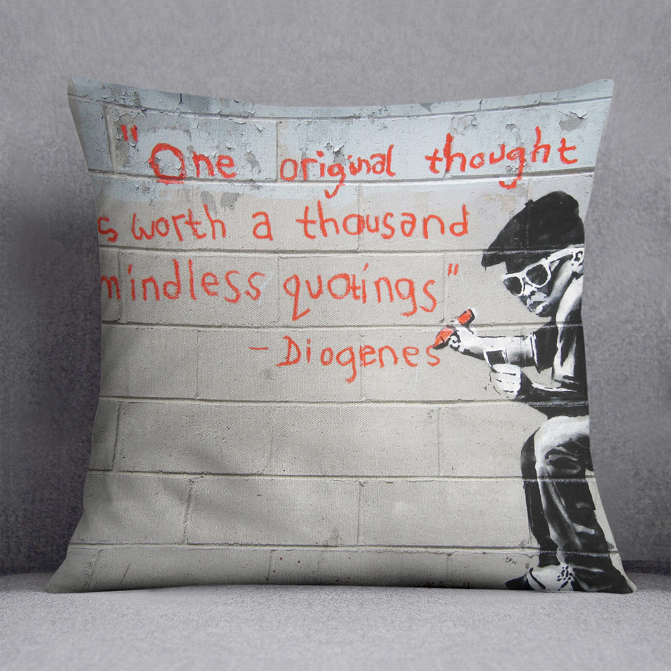 Banksy One Original Thought Cushion featuring vibrant abstract design on luxurious vegan faux suede, perfect for home decor.