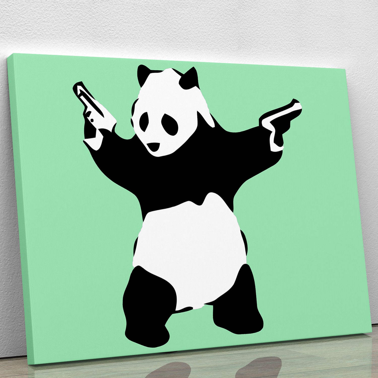 Banksy Panda Green Canvas Print featuring a playful panda on a vibrant green background, perfect for modern decor.