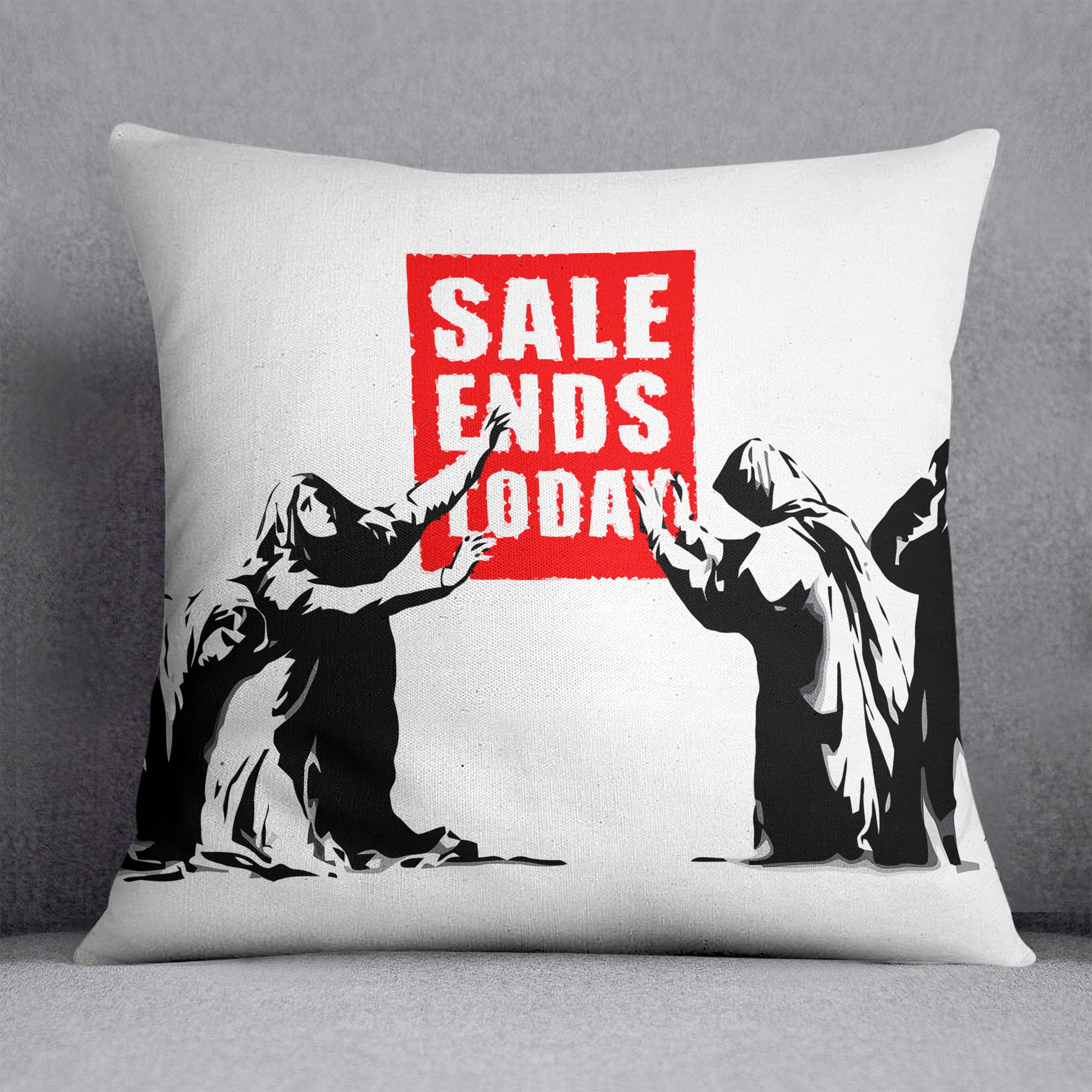 A vibrant Banksy Sale Ends Today Cushion featuring abstract designs on luxurious vegan faux suede, perfect for home decor.