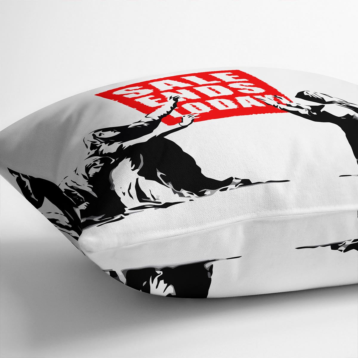 A vibrant Banksy Sale Ends Today Cushion featuring abstract designs on luxurious vegan faux suede, perfect for home decor.
