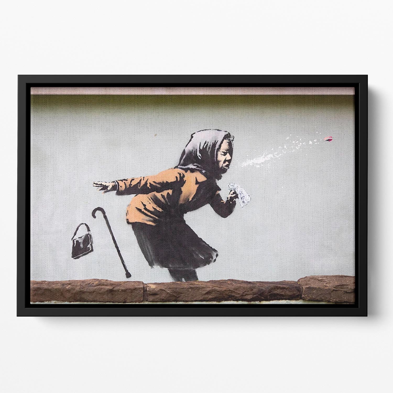 Banksy Sneezing Woman Floating Framed Canvas artwork featuring vibrant colors and a contemporary design in a handcrafted wooden frame.