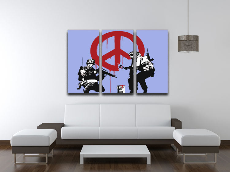 Banksy Soldiers Painting CND Sign Blue 3 Split Panel Canvas Print featuring three panels with vibrant blue tones and modern art design.