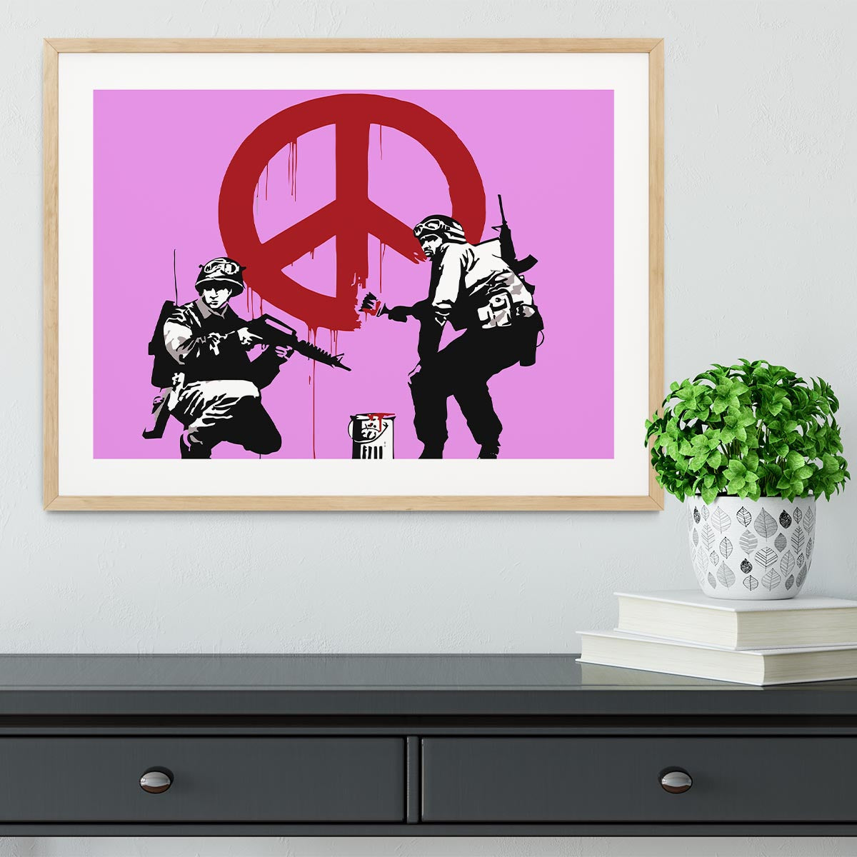 Banksy Soldiers Painting CND Sign in a purple framed print, showcasing vibrant colors and intricate details.