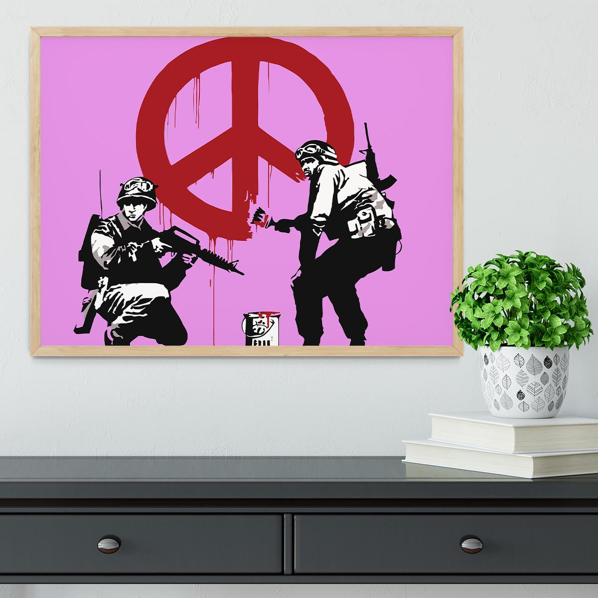 Banksy Soldiers Painting CND Sign in a purple framed print, showcasing vibrant colors and intricate details.