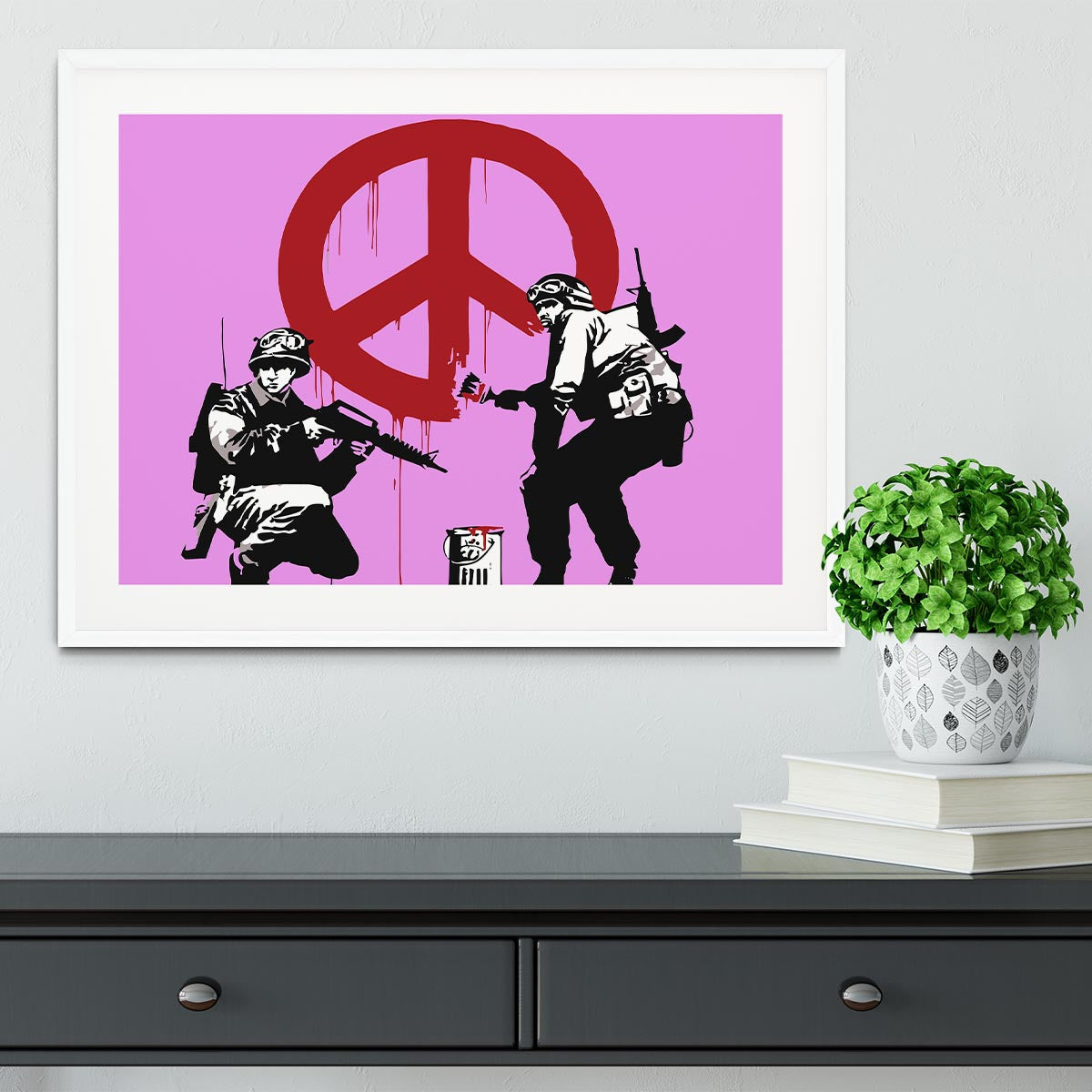 Banksy Soldiers Painting CND Sign in a purple framed print, showcasing vibrant colors and intricate details.