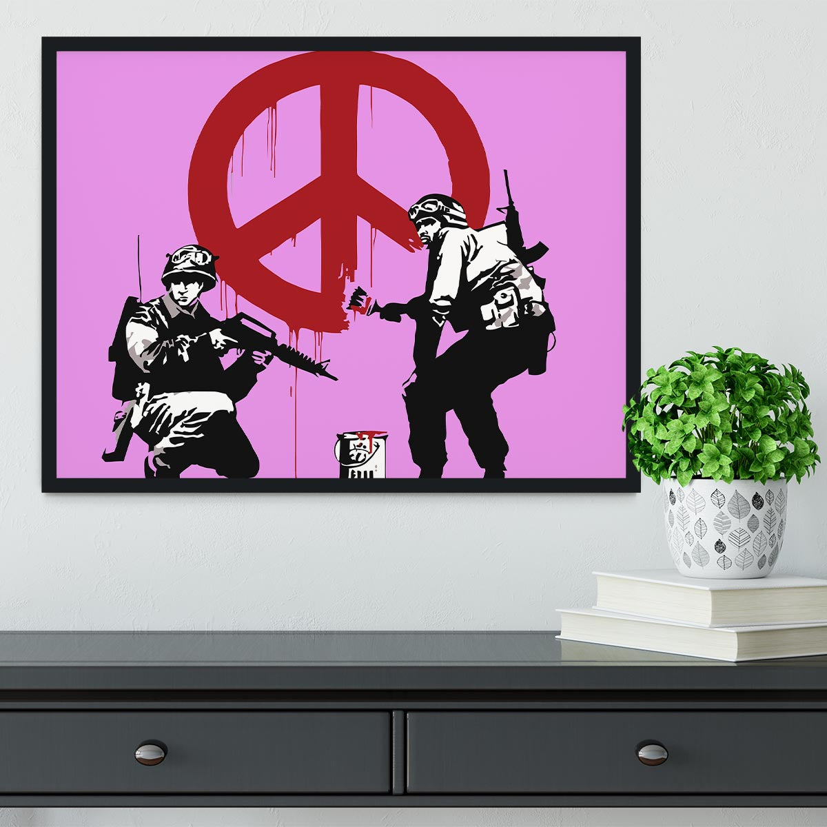 Banksy Soldiers Painting CND Sign in a purple framed print, showcasing vibrant colors and intricate details.