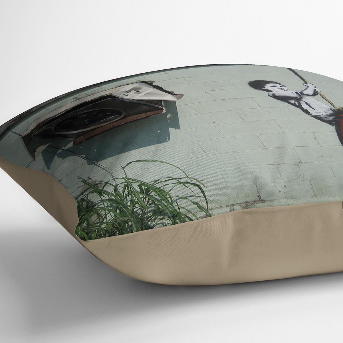 Banksy Swing Boy Cushion featuring vibrant abstract design on luxurious vegan faux suede, perfect for home decor.