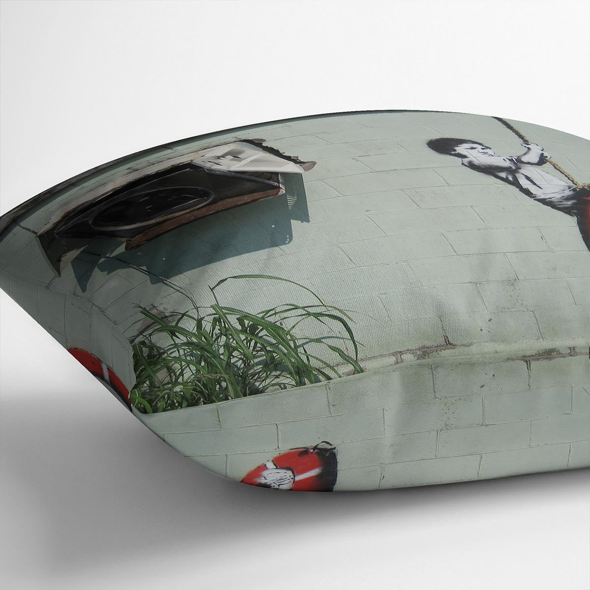 Banksy Swing Boy Cushion featuring vibrant abstract design on luxurious vegan faux suede, perfect for home decor.