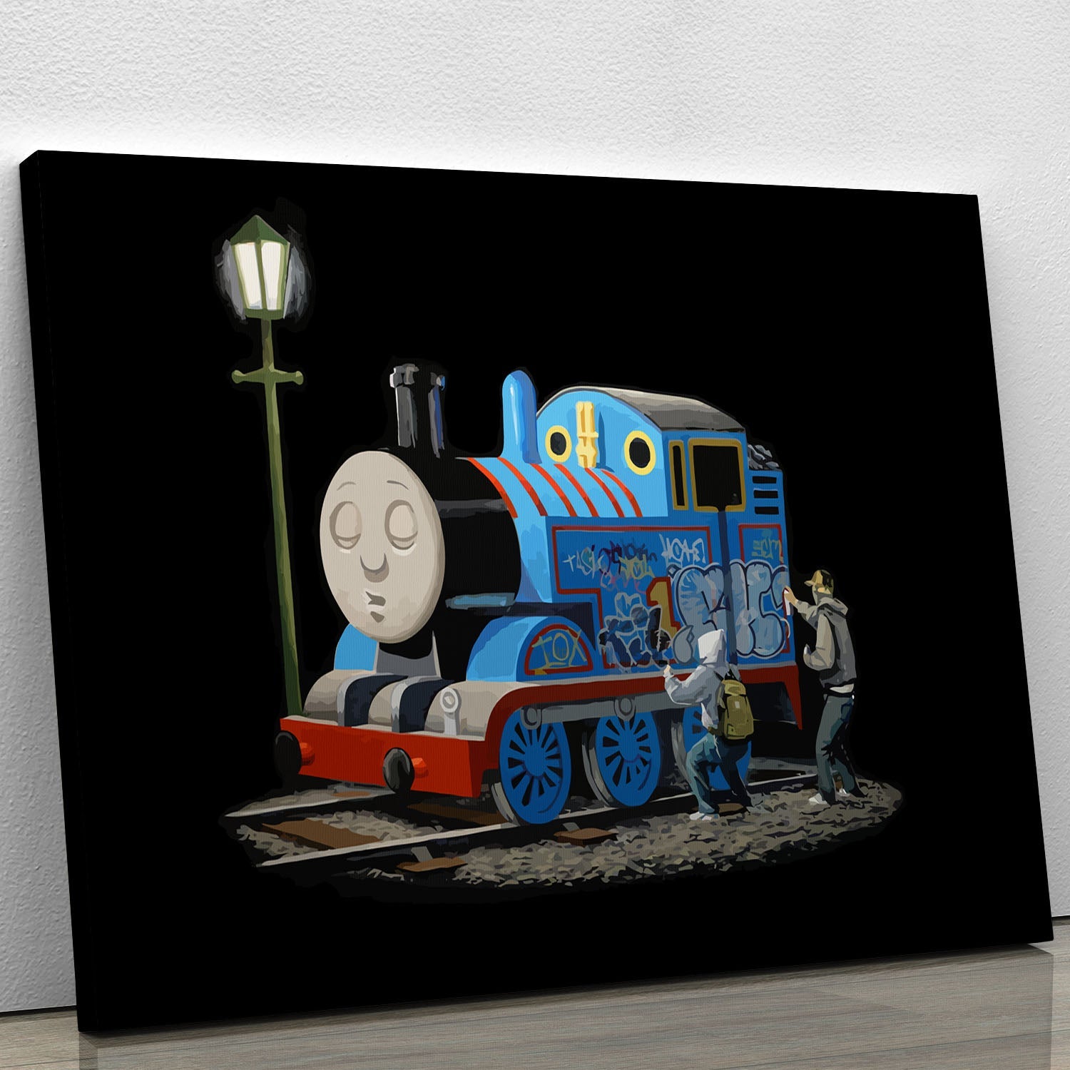 Banksy Thomas the Tank Engine canvas print featuring vibrant colors and iconic design, perfect for home or office decor.