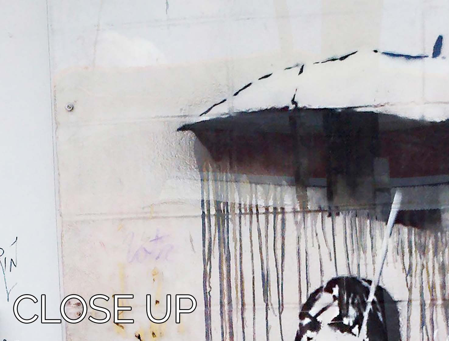 Banksy Umbrella Girl 3 Split Panel Canvas Print showcasing a modern art design with vibrant colors and intricate details.