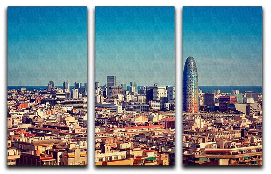 Three-panel canvas print featuring the Barcelona skyline with skyscrapers, showcasing vibrant colors and modern design.