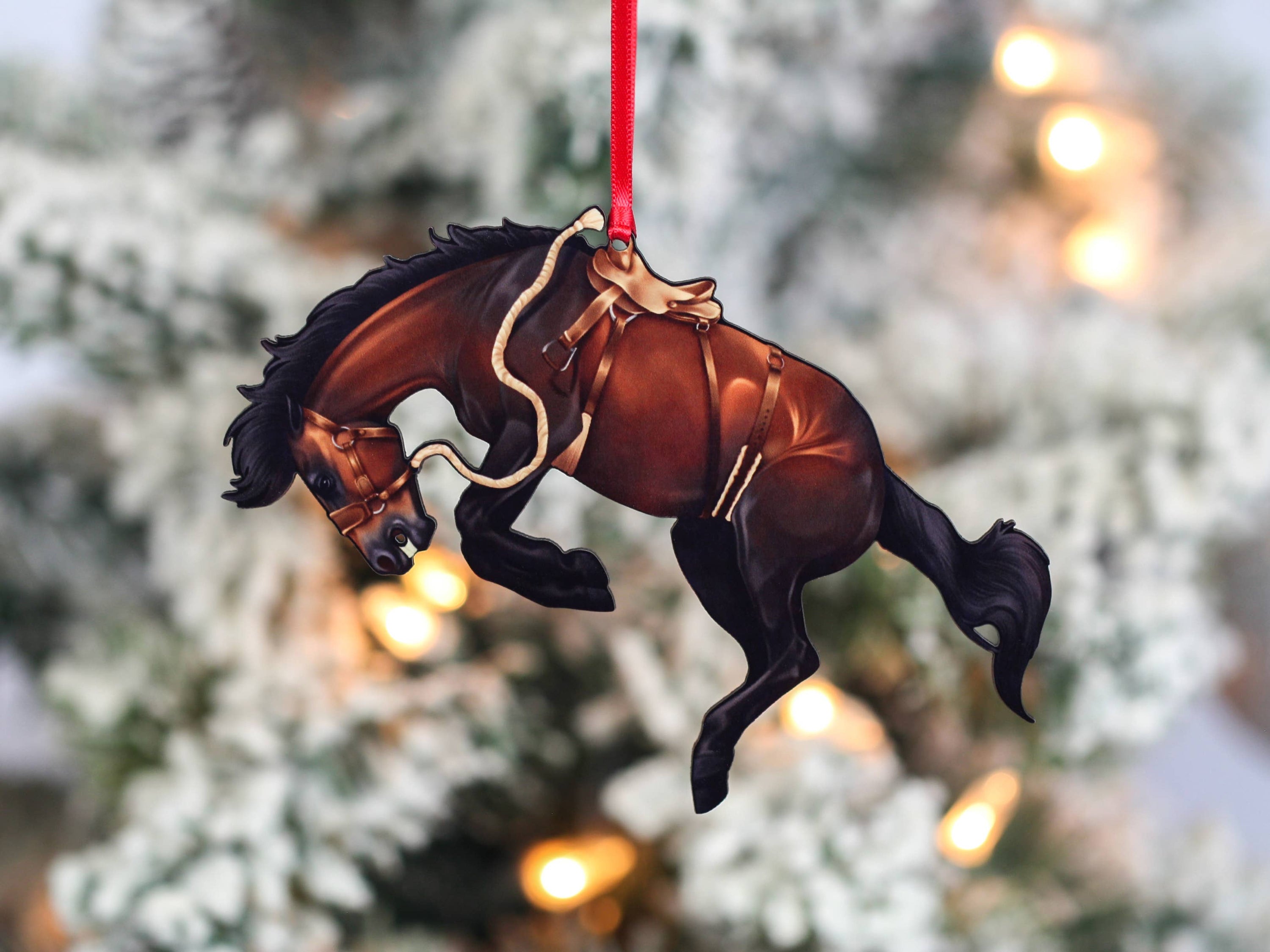 A beautifully crafted bay bucking horse ornament made from composite wood, showcasing intricate details and a glossy finish, perfect for western decor.