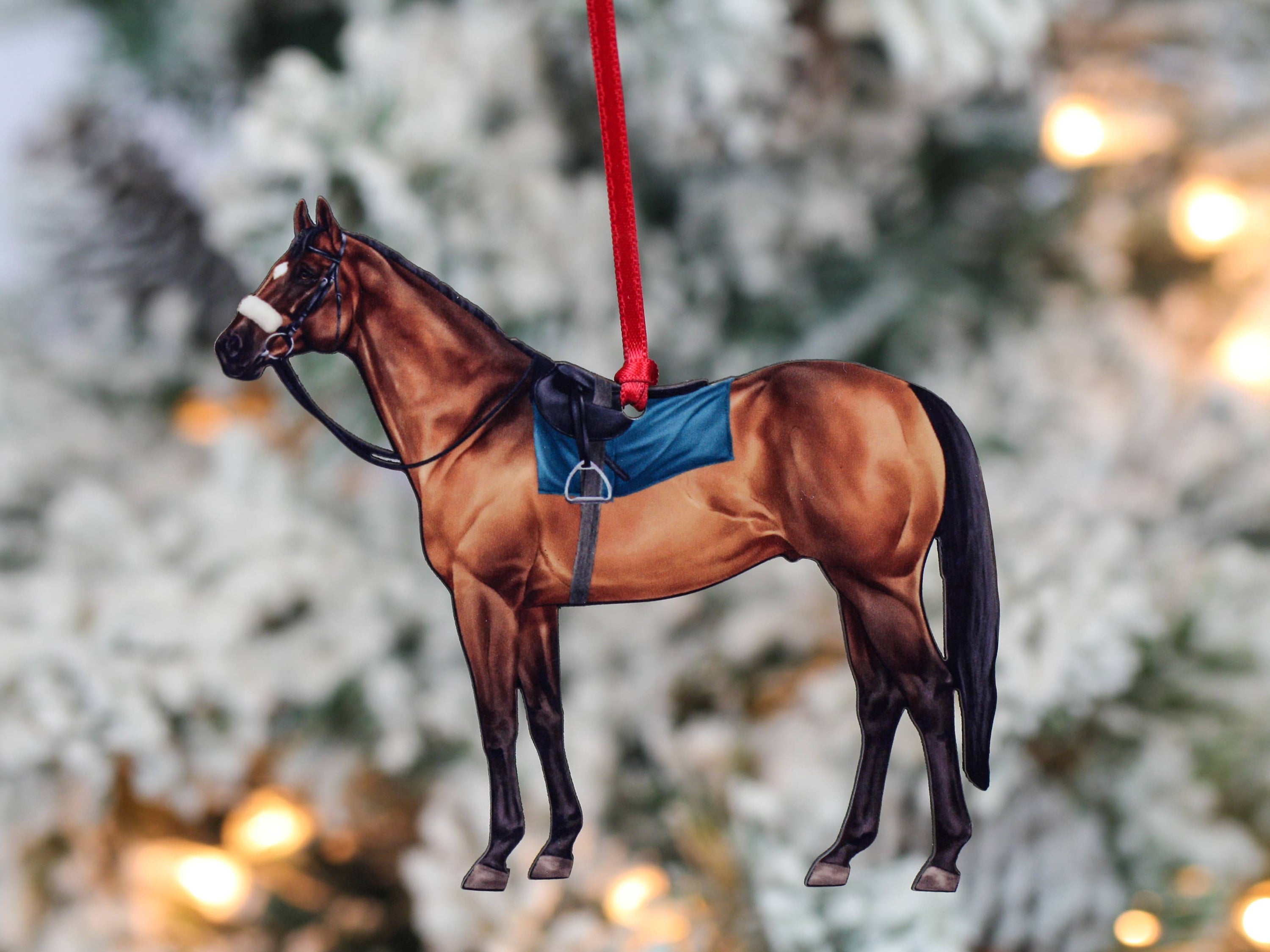 A beautifully crafted bay Thoroughbred Race Horse ornament made from composite wood, featuring glossy artwork and a dark brown back.