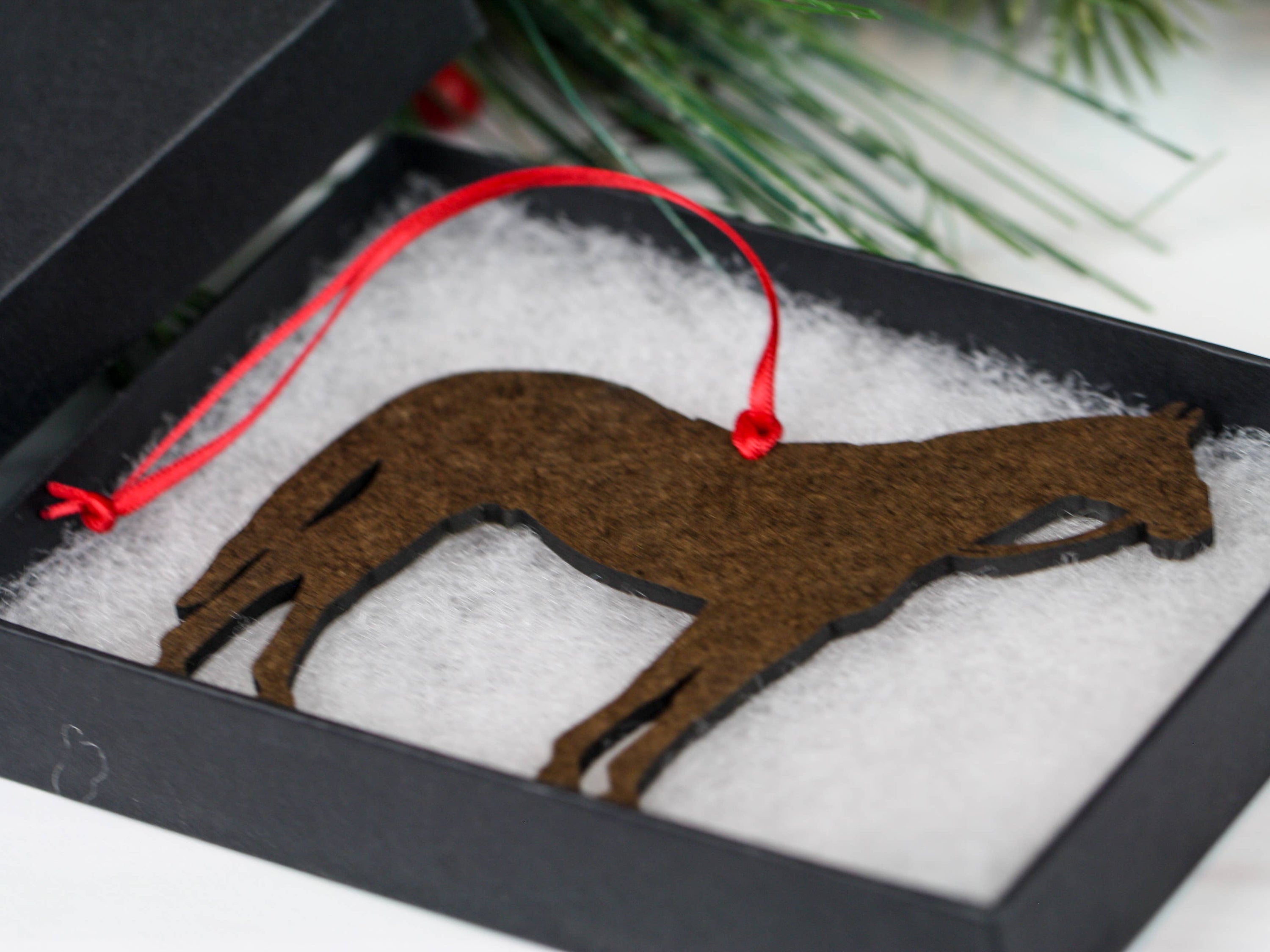 A beautifully crafted bay Thoroughbred Race Horse ornament made from composite wood, featuring glossy artwork and a dark brown back.