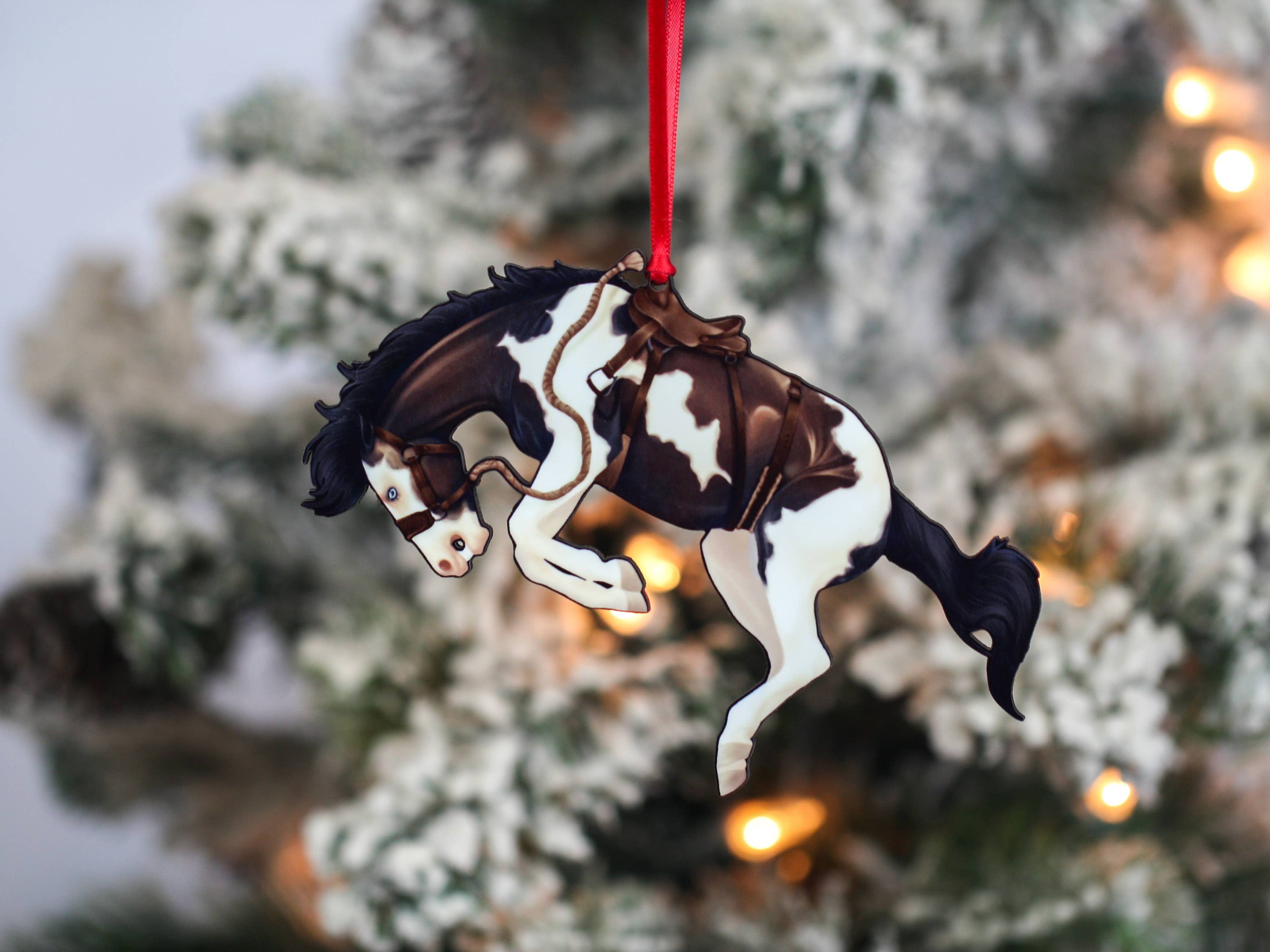 Bay Tobiano Bucking Rodeo Christmas Horse Ornament, handmade from composite wood, featuring a glossy finish and intricate laser-cut design.