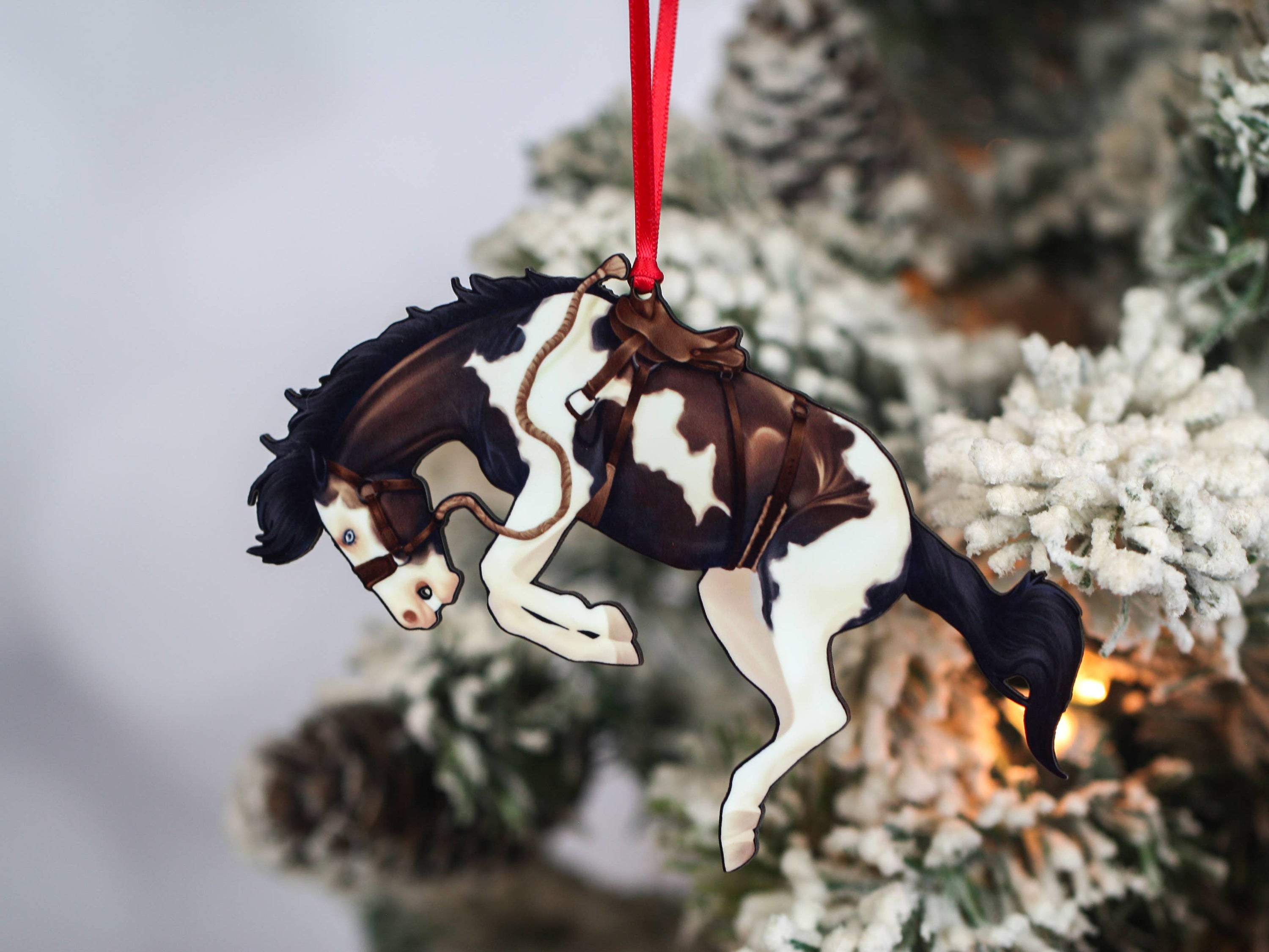 Bay Tobiano Bucking Rodeo Christmas Horse Ornament, handmade from composite wood, featuring a glossy finish and intricate laser-cut design.