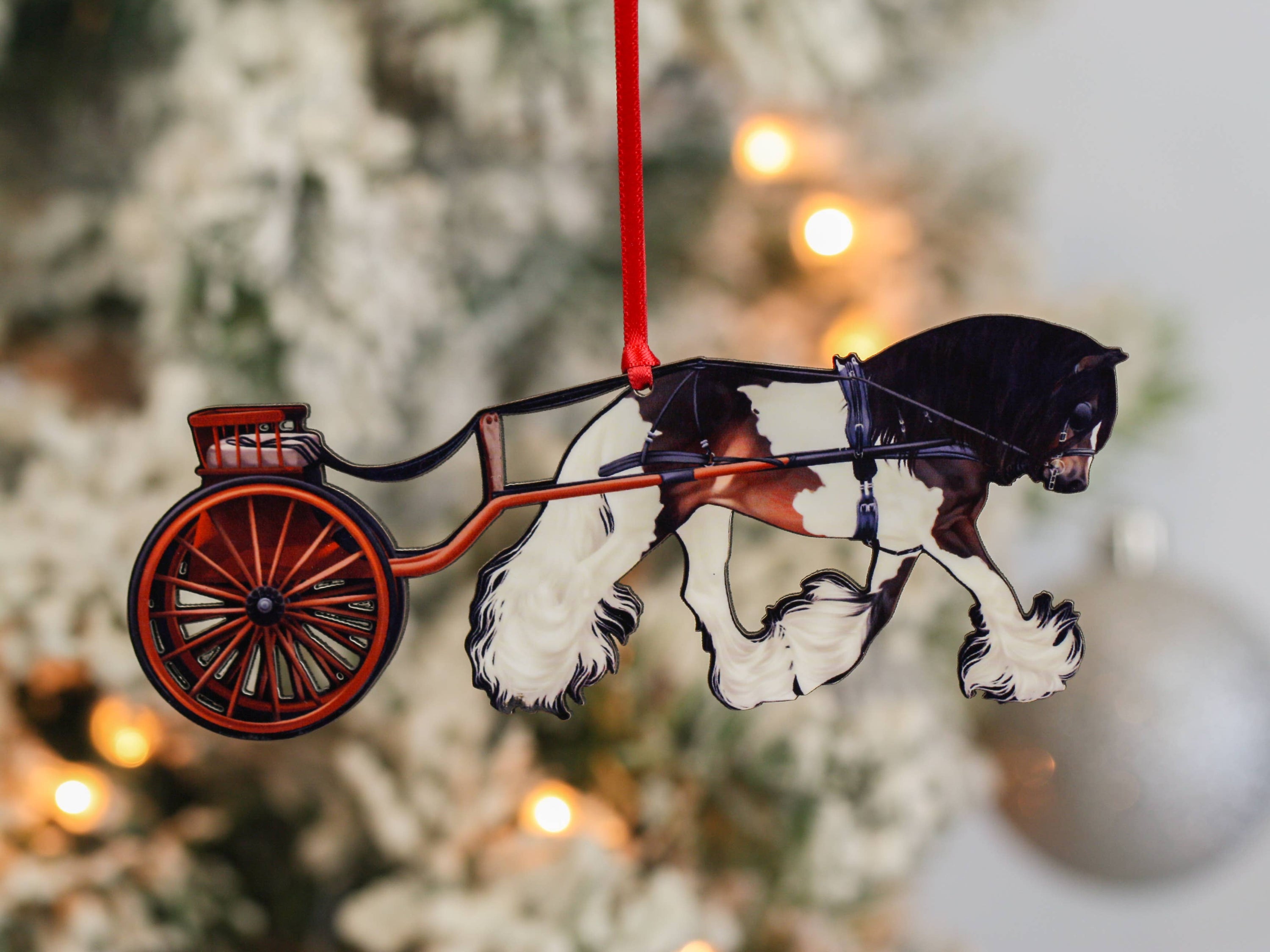Handcrafted Bay Tobiano Gypsy Cob ornament pulling a cart, made from composite wood with glossy finish.