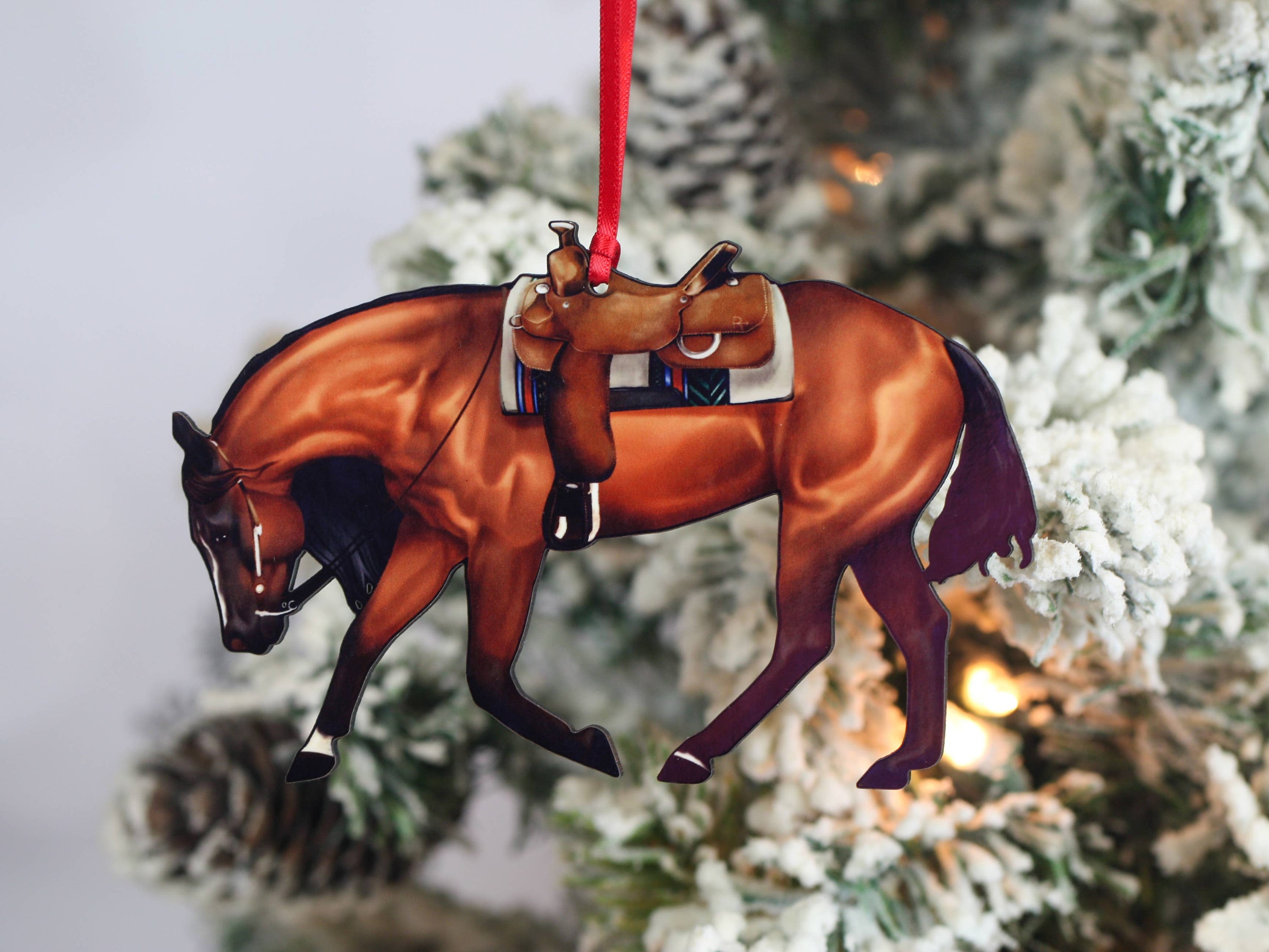 Bay Western Riding Christmas Ornament featuring a Quarter Horse, handmade from composite wood with red and black ribbons.