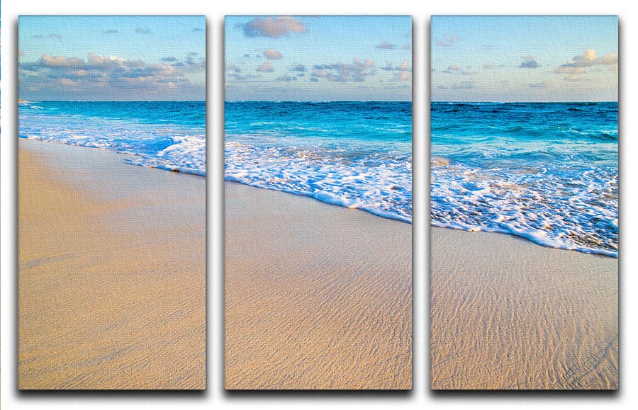 A stunning 3-panel canvas print depicting a beautiful beach and tropical sea, showcasing vibrant colors and serene scenery.