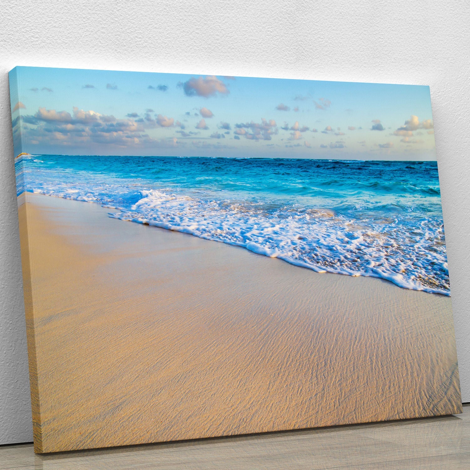 A vibrant canvas print featuring a beautiful tropical beach scene with clear blue waters and palm trees.