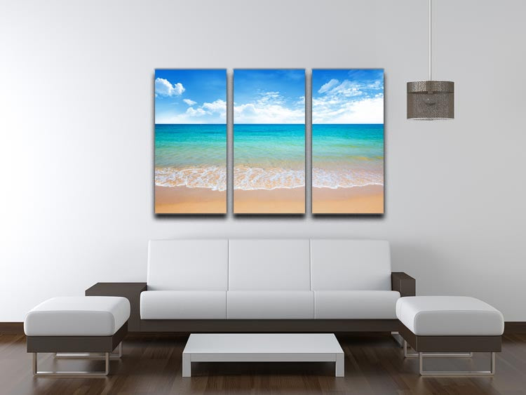 A beautiful 3-panel canvas print featuring a serene beach and tropical sea scene, showcasing vibrant colors and calming imagery.