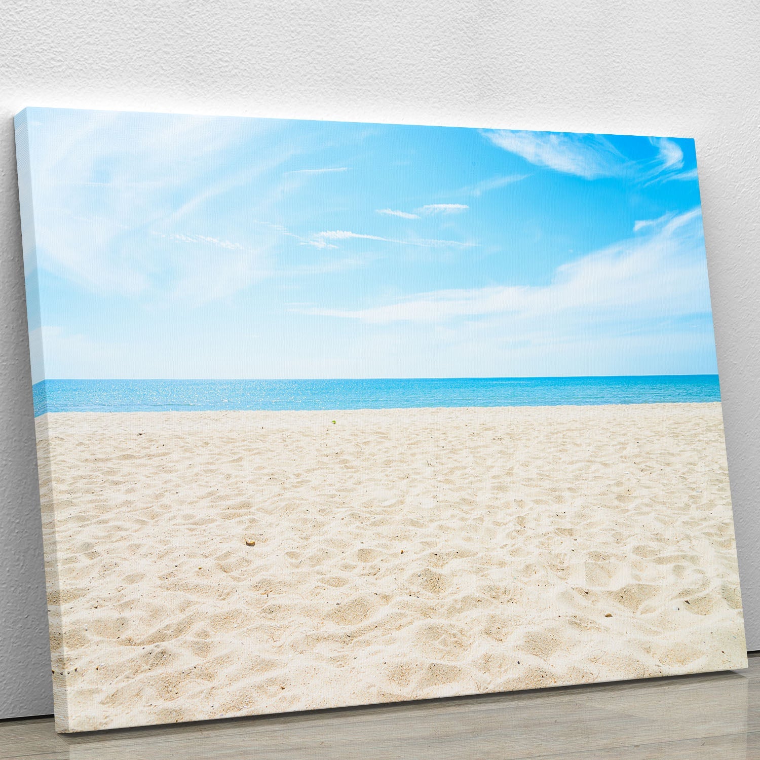 A beautiful beach background canvas print featuring serene ocean waves and a clear blue sky, perfect for home decor.