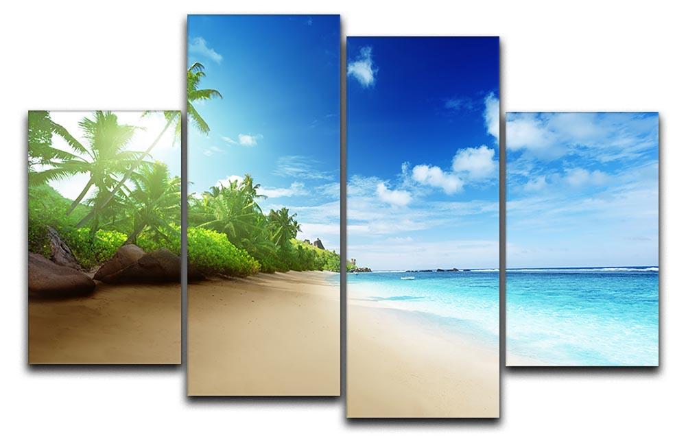 A stunning 4 split panel canvas artwork depicting a beach at sunset on Mahe Island, showcasing vibrant colors and serene scenery.