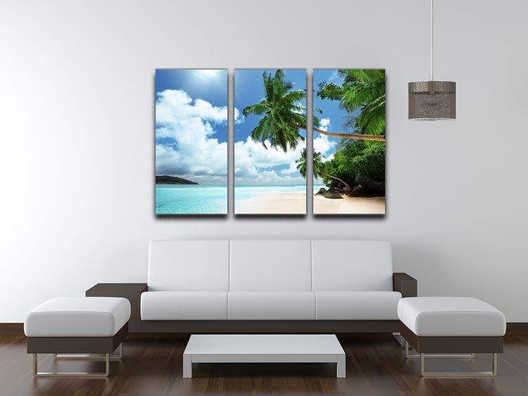 A beautiful 3-panel canvas print depicting a serene beach on Mahe island, showcasing vibrant colors and a tranquil atmosphere.