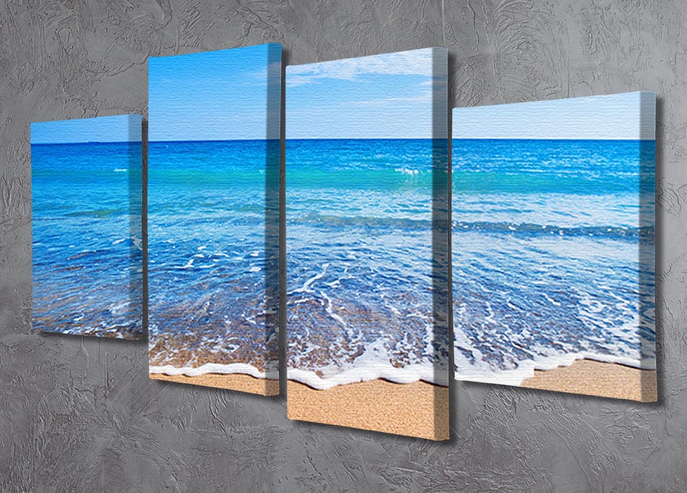 A beautiful 4-split canvas artwork depicting serene beach waves, showcasing vibrant colors and dynamic design.