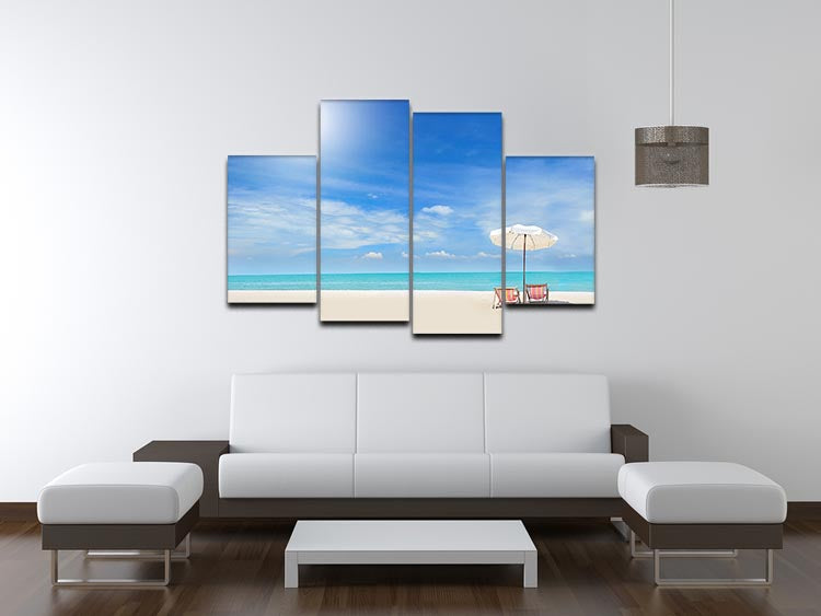 A beautiful 4 split panel canvas artwork depicting a beach scene with a cloudy blue sky, showcasing vibrant colors and serene imagery.