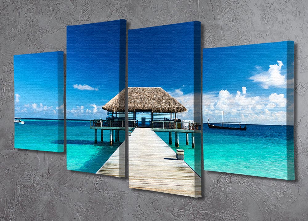 A beautiful 4 split panel canvas depicting a Maldives beach with a jetty, showcasing vibrant colors and serene scenery.