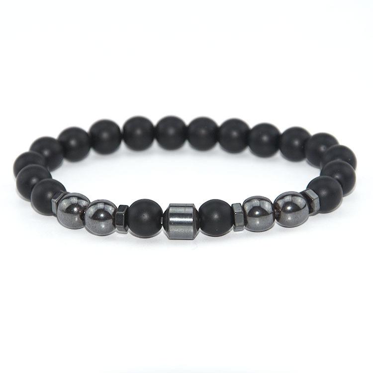 Elegant beaded bracelet featuring black magnet design with garnet stones, suitable for both men and women.